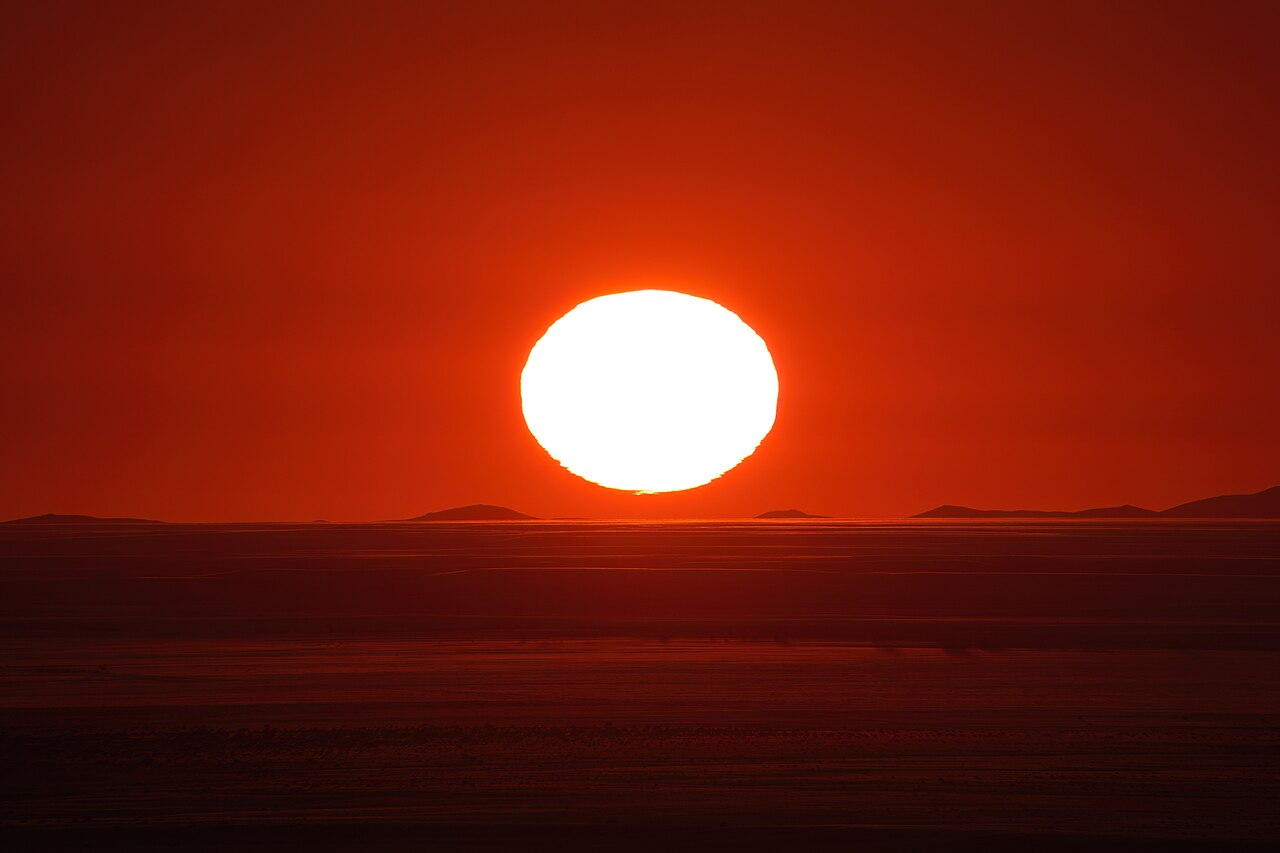 084 Sun setting in the Namib desert Photo by Giles Laurent